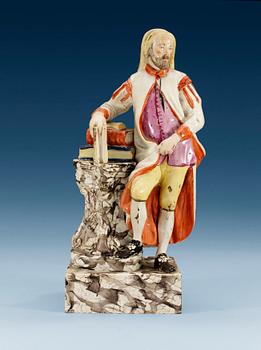 429. A creamware figure, presumably England, 18th Century.