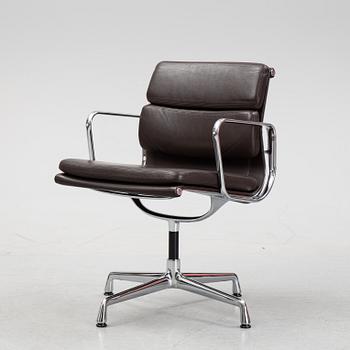 An EA 208 Soft Pad swivel chair by Charles and Ray Eames for Vitra, dated 2010.