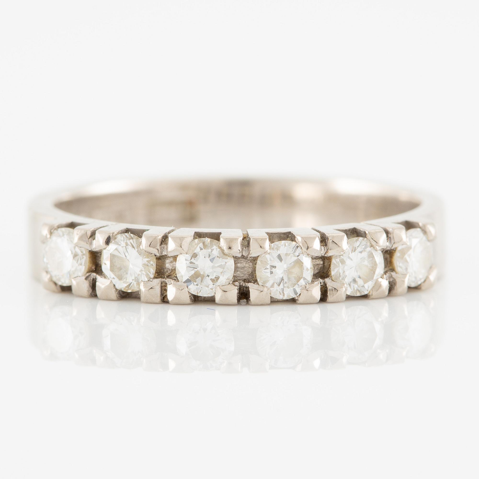 Ring, half eternity band in 18K white gold set with brilliant-cut diamonds.