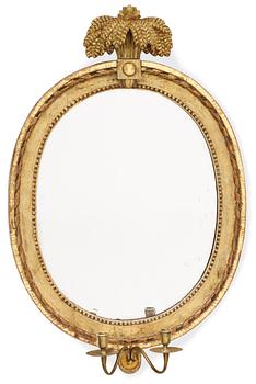 1006. A Gustavian two-light girandole mirror.