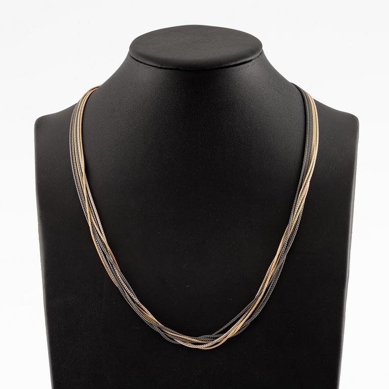 Collier, troligen Ole Lynggaard, sex rader, guld och silver.
