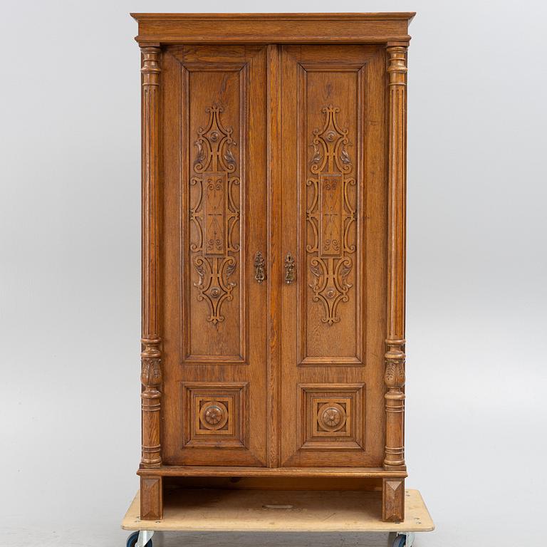 An oak cabinet, late 19th century.