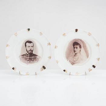 A pair of porcelain plates for Hache & Co, France.