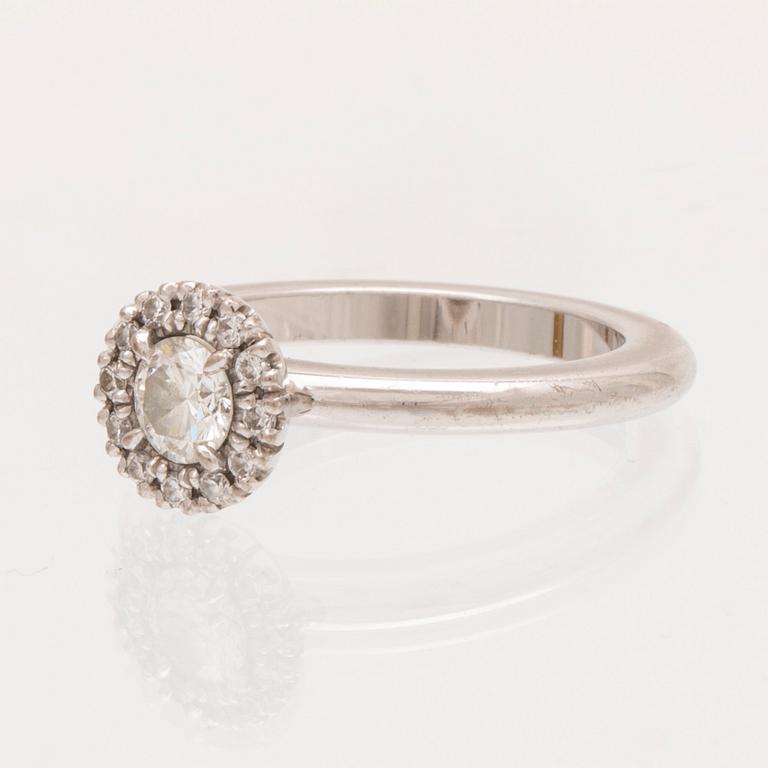 An 18K white gold ring with round brilliant cut diamonds by Engelbert, with GIA dossier.