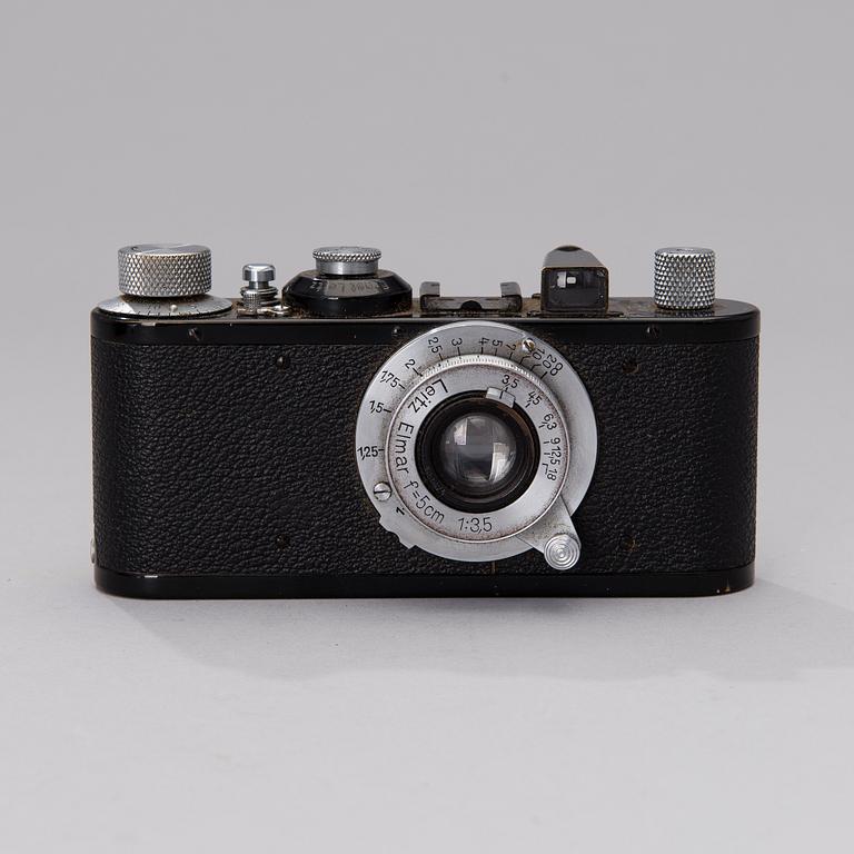 A black body Leica camera no 296865 with a Elmar lens made in 1938