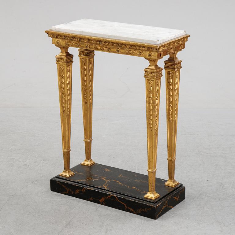 An early 19th Century console table.