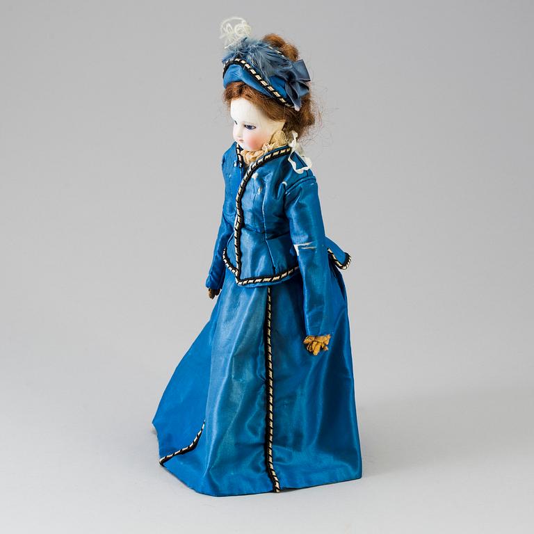 A bisque head fashion doll, probably France, late 19th century.