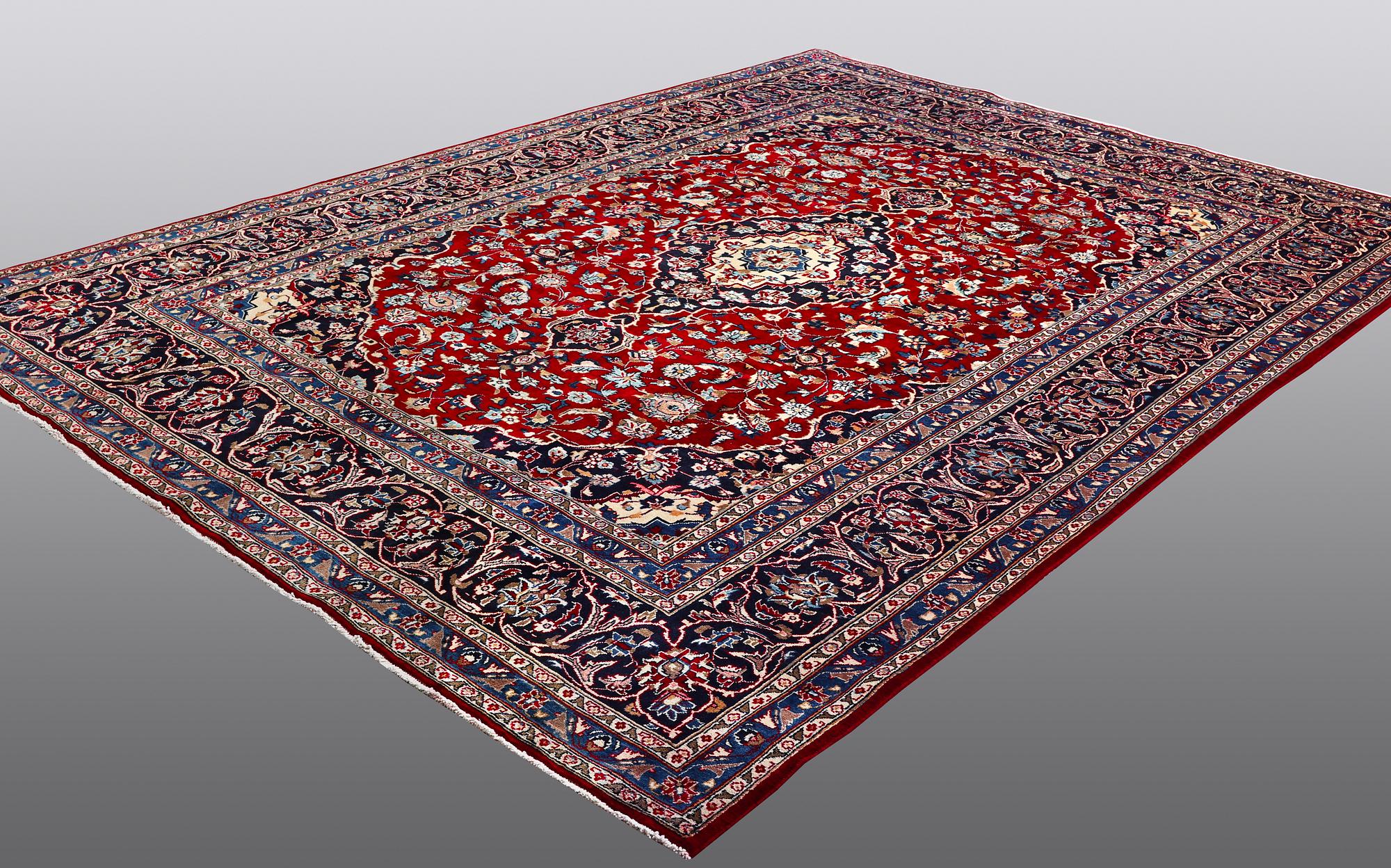 A carpet, Mashad, ca 346 x 248 cm.
