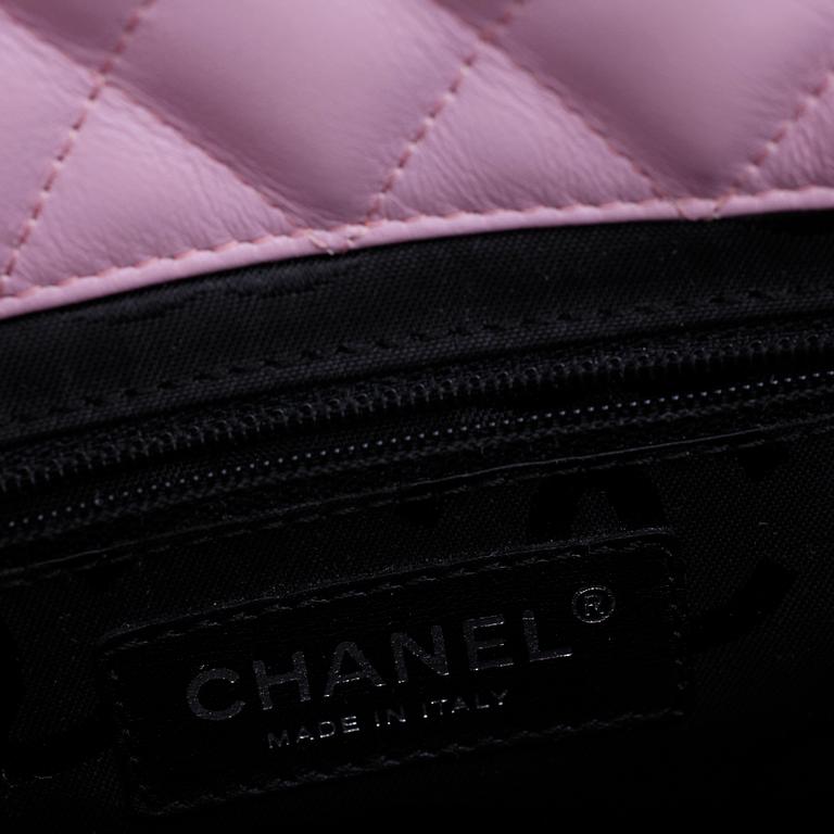 CHANEL, a pink leather "Small Shopping" handbag.