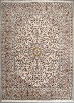 A Keshan rug, 400 x 295 cm.