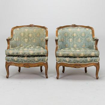 Fåtöljer, ett par och fotpall, 1900-talets mitt.