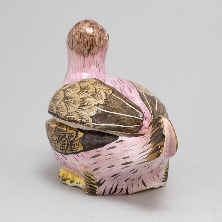 A faiance butter tureen with cover, 18th/19th century.