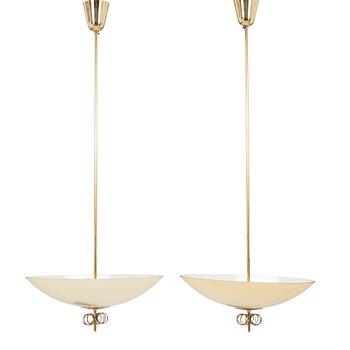 Paavo Tynell, a pair of mid-20th century pendant lights for Idman.