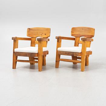 Stig Sandqvist, a pair of pine armchairs, Vemdalia, Sweden, second half of the 20th century.