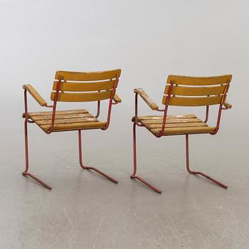 A mid 20th century Garden armchairs, easy chair and a table, Bjärnum, Sweden.