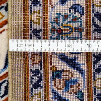 A carpet, Kashan signed, Janghair, ca 363 x 260 cm.