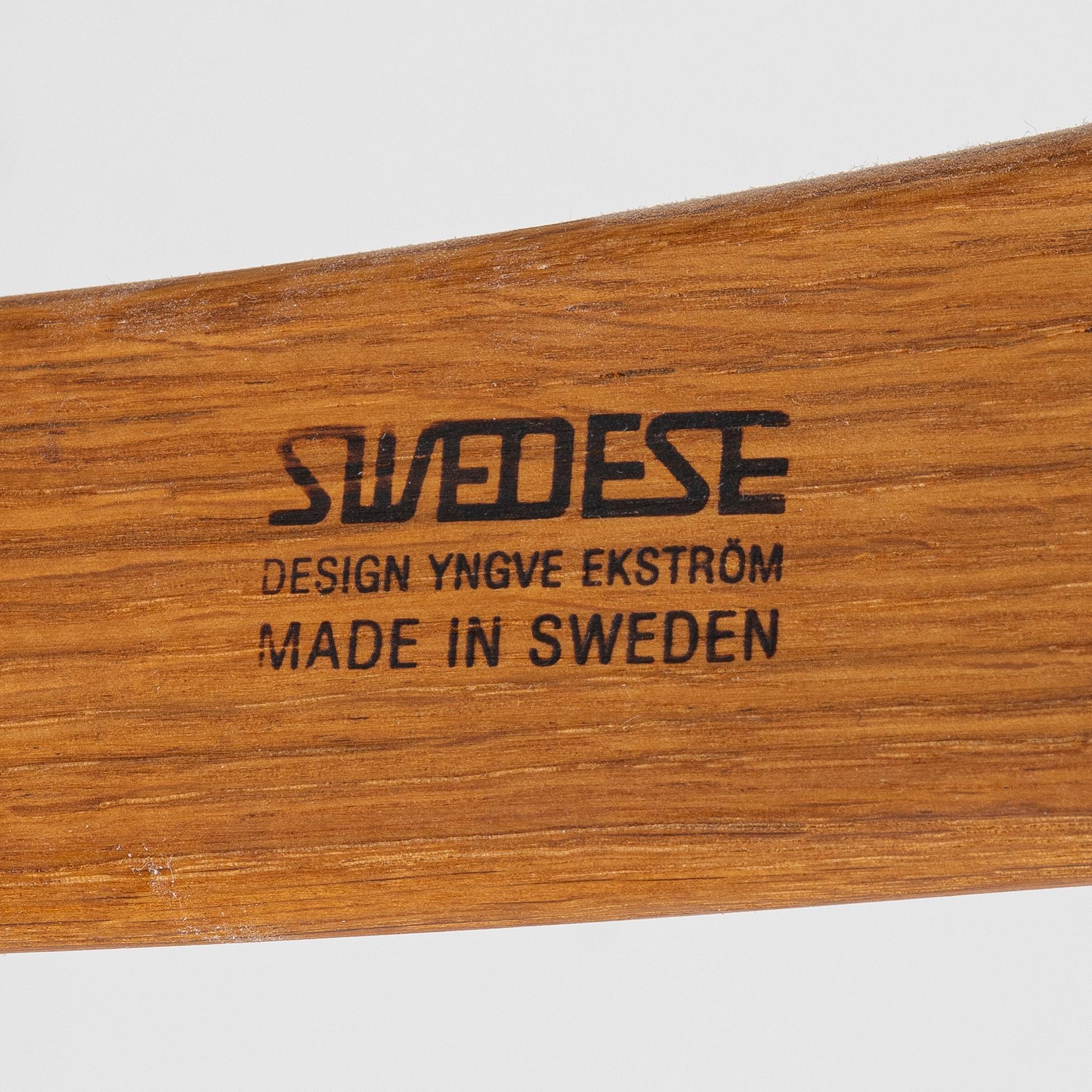 Yngve Ekström, a 'Lamino' armchair with ottoman and sidetable, Swedese, Sweden, 21st century.