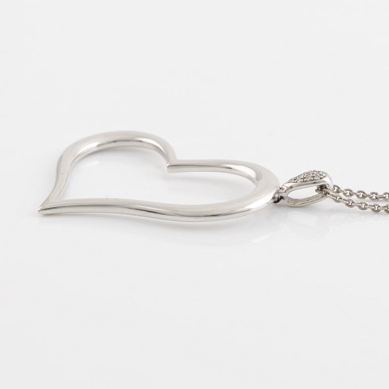 Piaget, 18K white gold and brilliant cut diamond heart necklace.