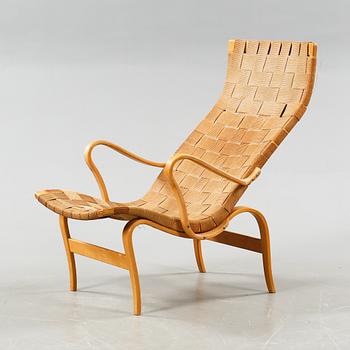 A "Pernilla" easy chair, designed by Bruno Mathsson for Firma Karl Matsson, made 1943.