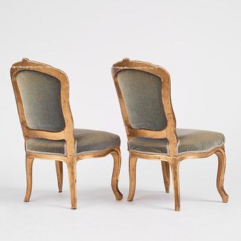 A pair of Swedish giltwood Rococo chairs, later part of the 18th century.