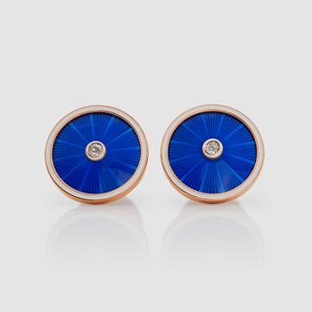 1323. A pair of brilliant-cut diamond and blue enamel cufflinks. Total carat weight of diamonds circa 0.14 ct.