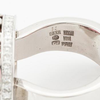 A Gaudy platinum ring set with a faceted tourmaline.