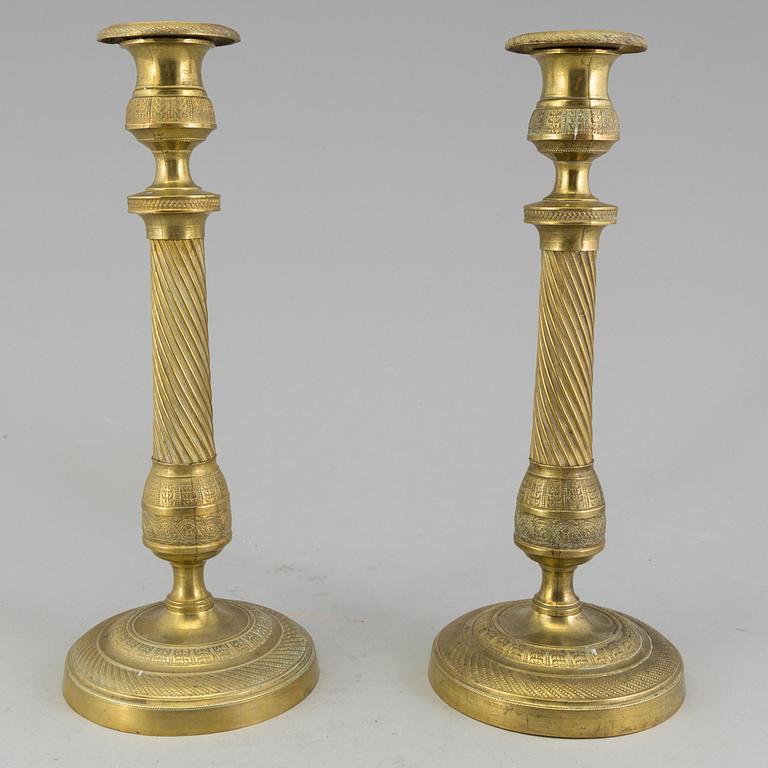 A pair of 'Empire' candlesticks, probably French.