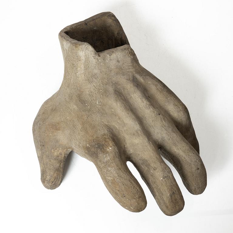 Allan Ebeling, a ceramic sculpture of a hand.