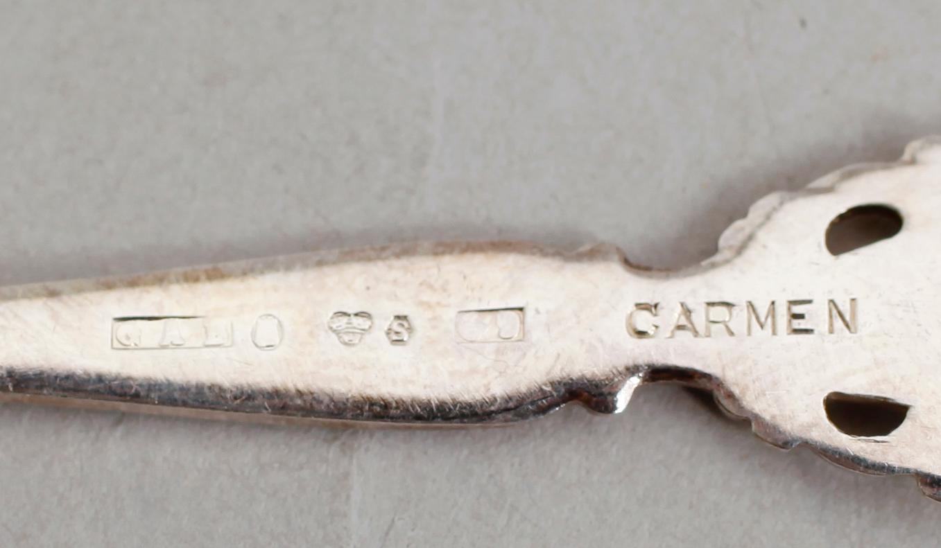 MOCKASKEDAR, 12 st, silver, modell Carmen, GAB, Stockholm 1964. Vikt ca 98 gram.