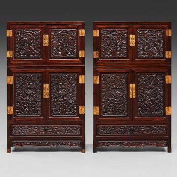 351. A pair of Chinese hardwood cupboards, late Qing dynasty (1644-1912).