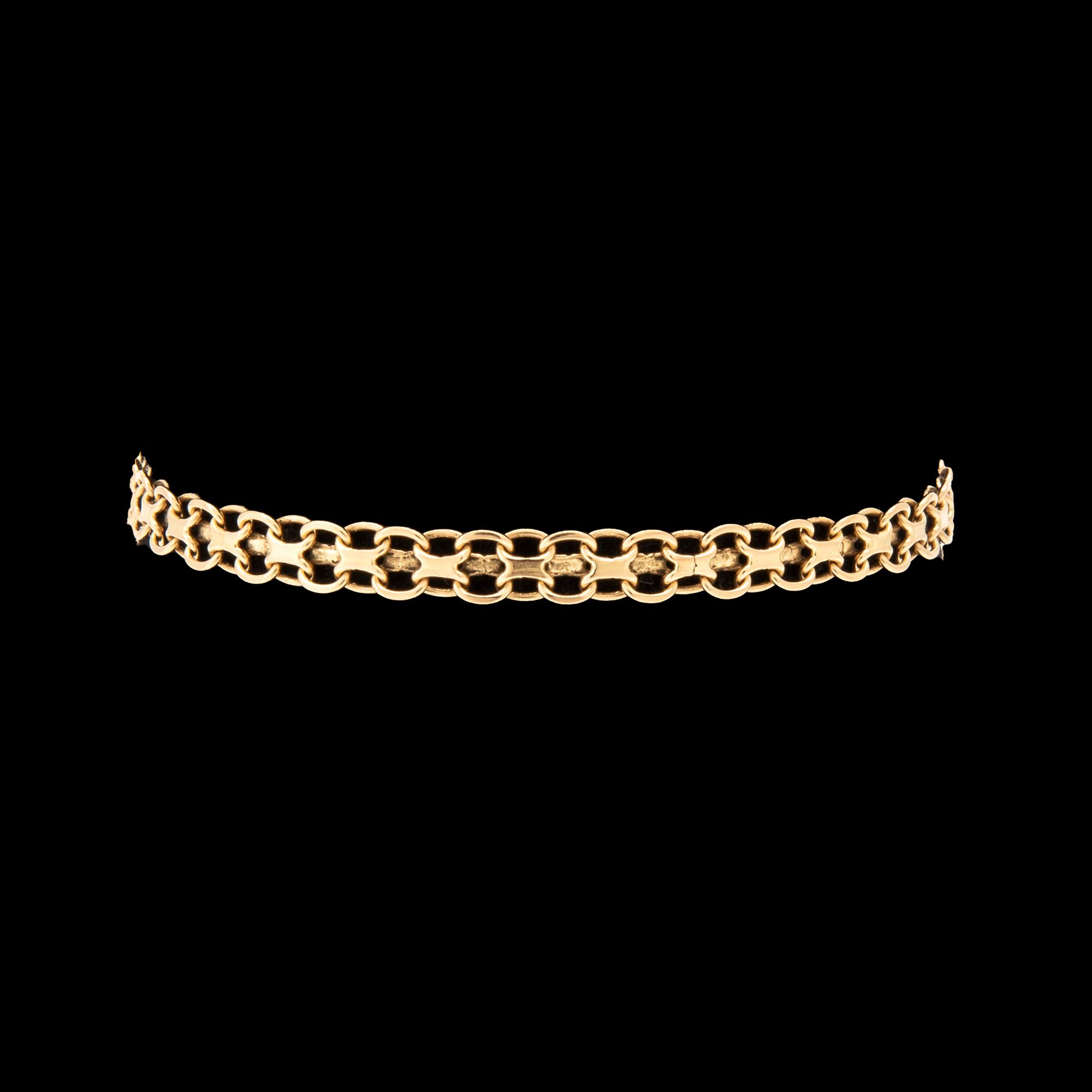 An 18K gold x-link bracelet.