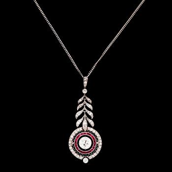 1039. An old cut diamond, app. 1 cts, and ruby pendant, ca 1915.