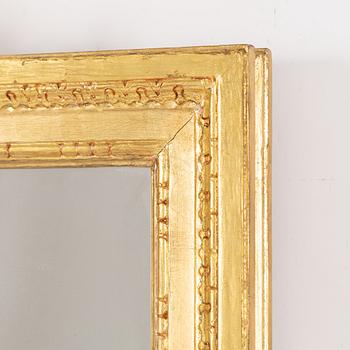 A "Meunier" mirror wall lamp from IKEA's 18th-century series, late 20th century.