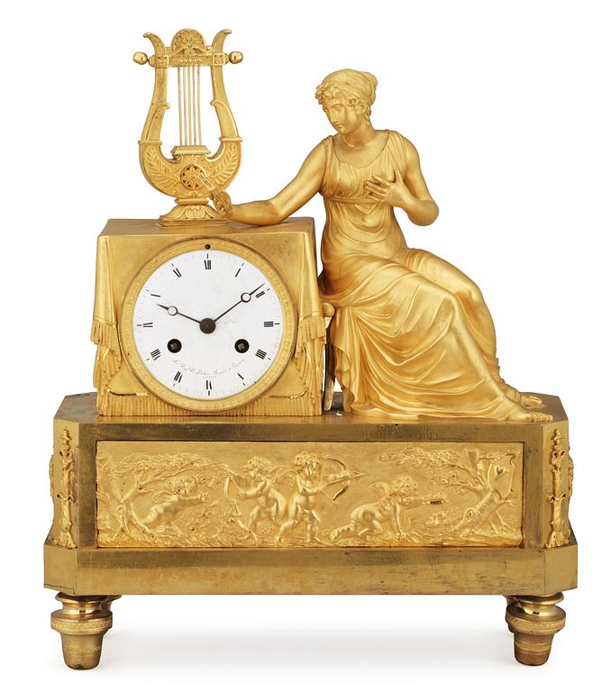 A French Empire early 19th century gilt bronze mantel clock.