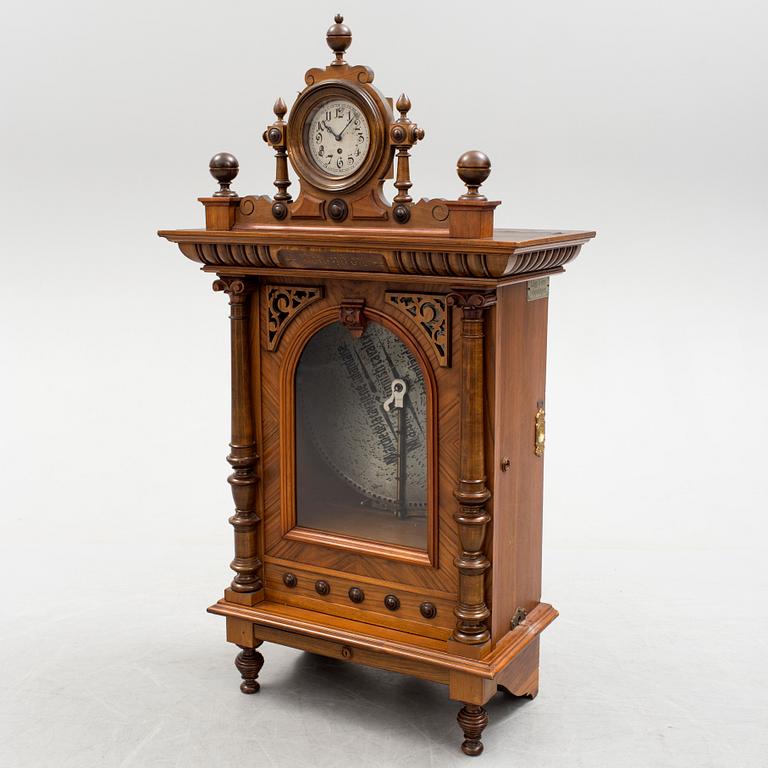 Polyphone with clock in walnut case, late 19th Century.