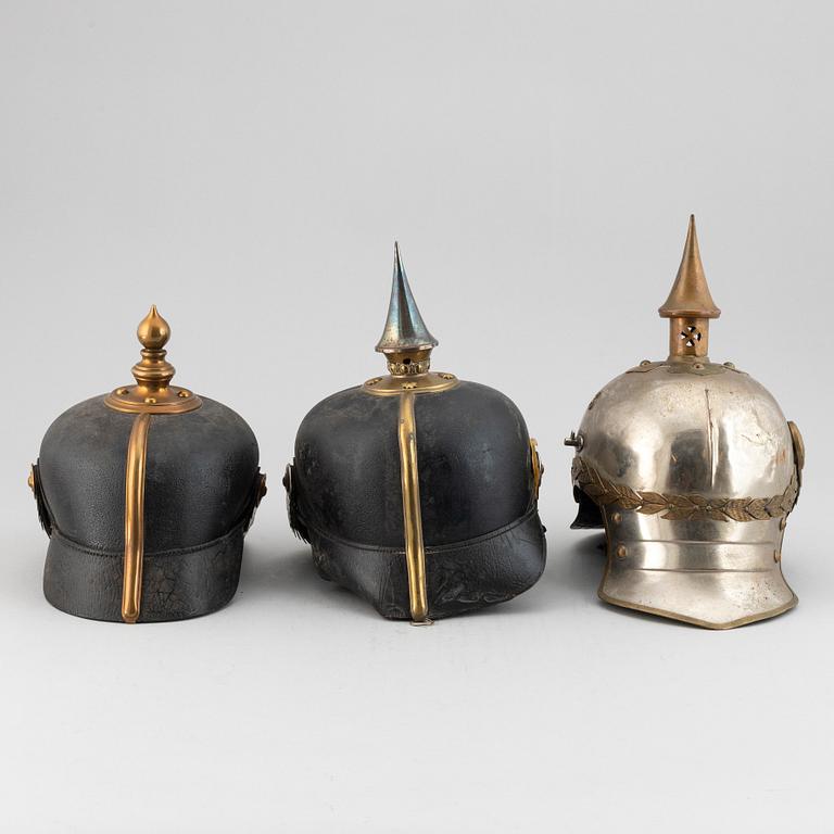 Three Swedish military helmets.