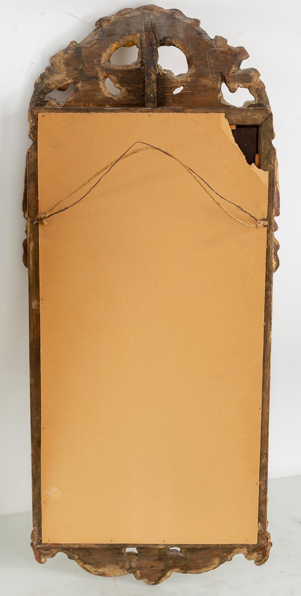 A mid 20th century Rococo style mirror.