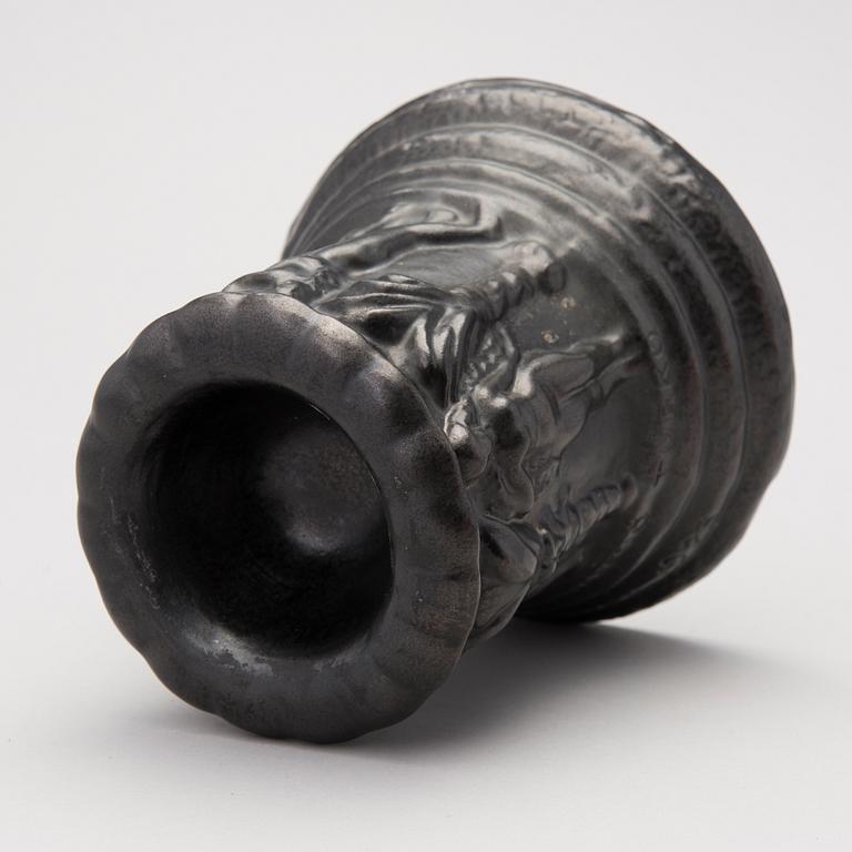 a plaster decoration bowl, signed Aarre Aaltonen 1923.