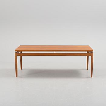 GRETE JALK, a teak coffee table fron France, Denmark, 1963.