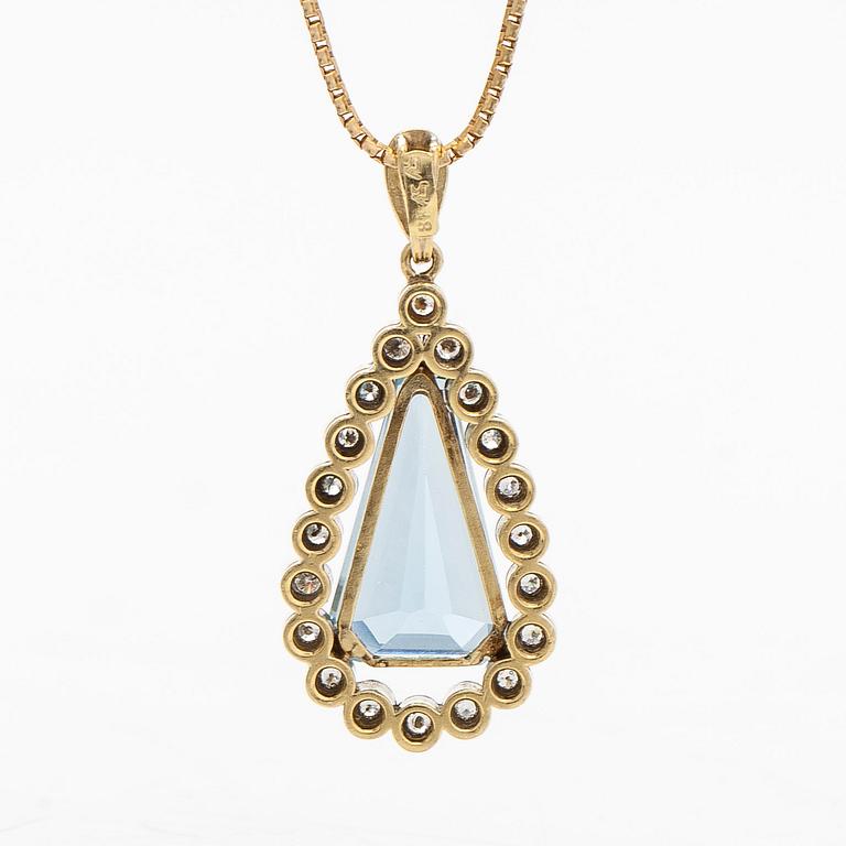 Amsterdam Sauer,an 18K gold pendant with a topaz and diamonds, chain in 14K gold, Unoaerre, Italy.