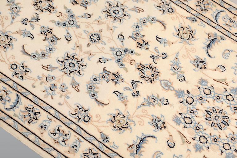 A Nain runner, part silk, so called 9LAA, c. 315 x 81 cm.