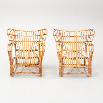 A pair of rattan easy chairs, possibly Viggo Boesen.