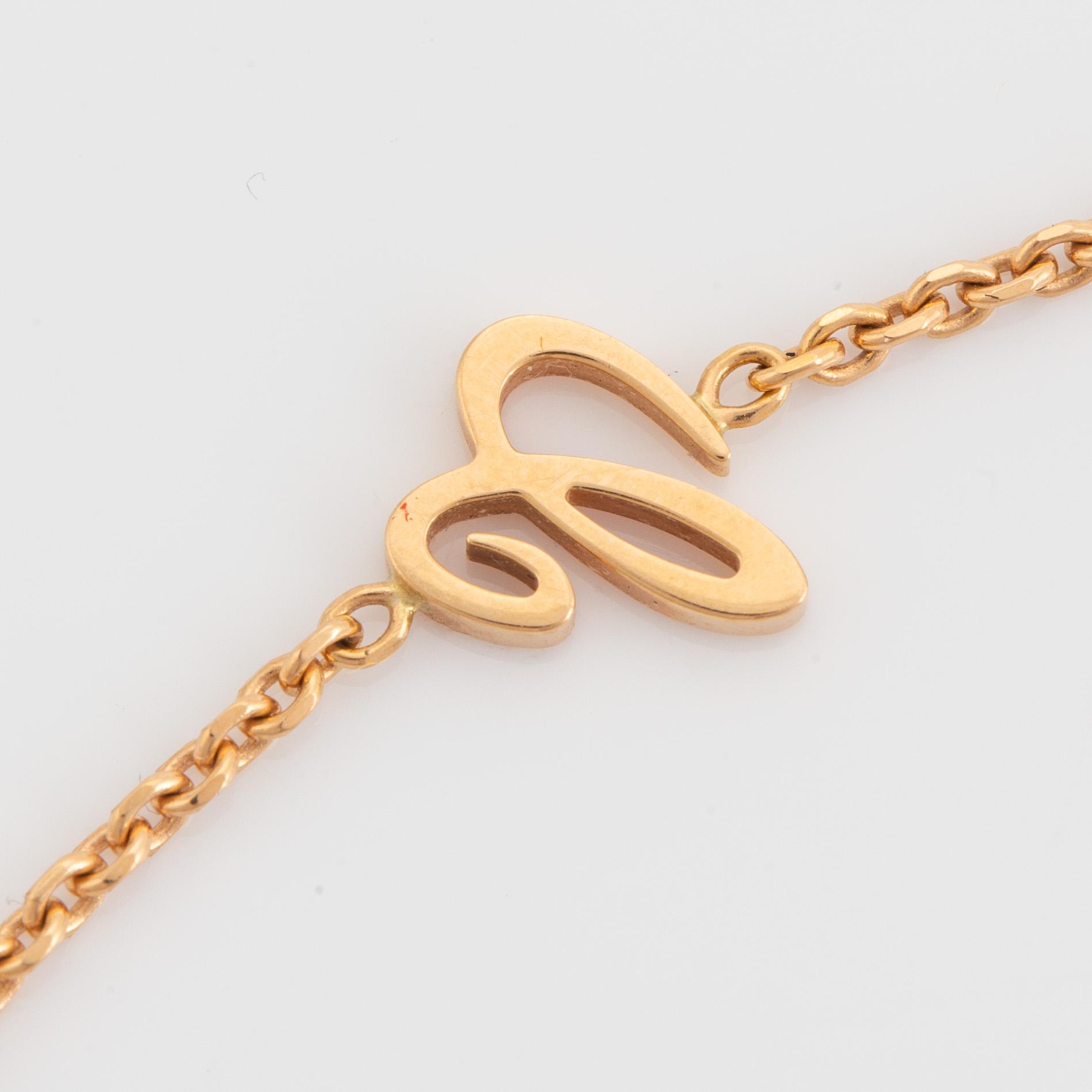 Chopard, Happy diamonds "Fatimas hand" 18K gold and brilliant cut diamond necklace.