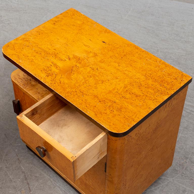 A pair of 1930/40's bedside tables.