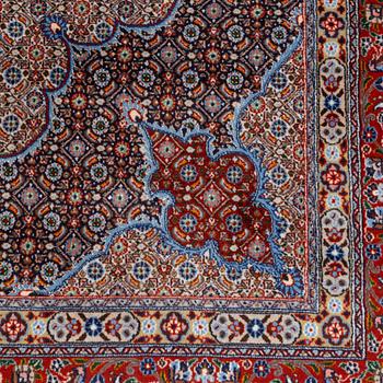 A Moud carpet, c. 345 x 250 cm.