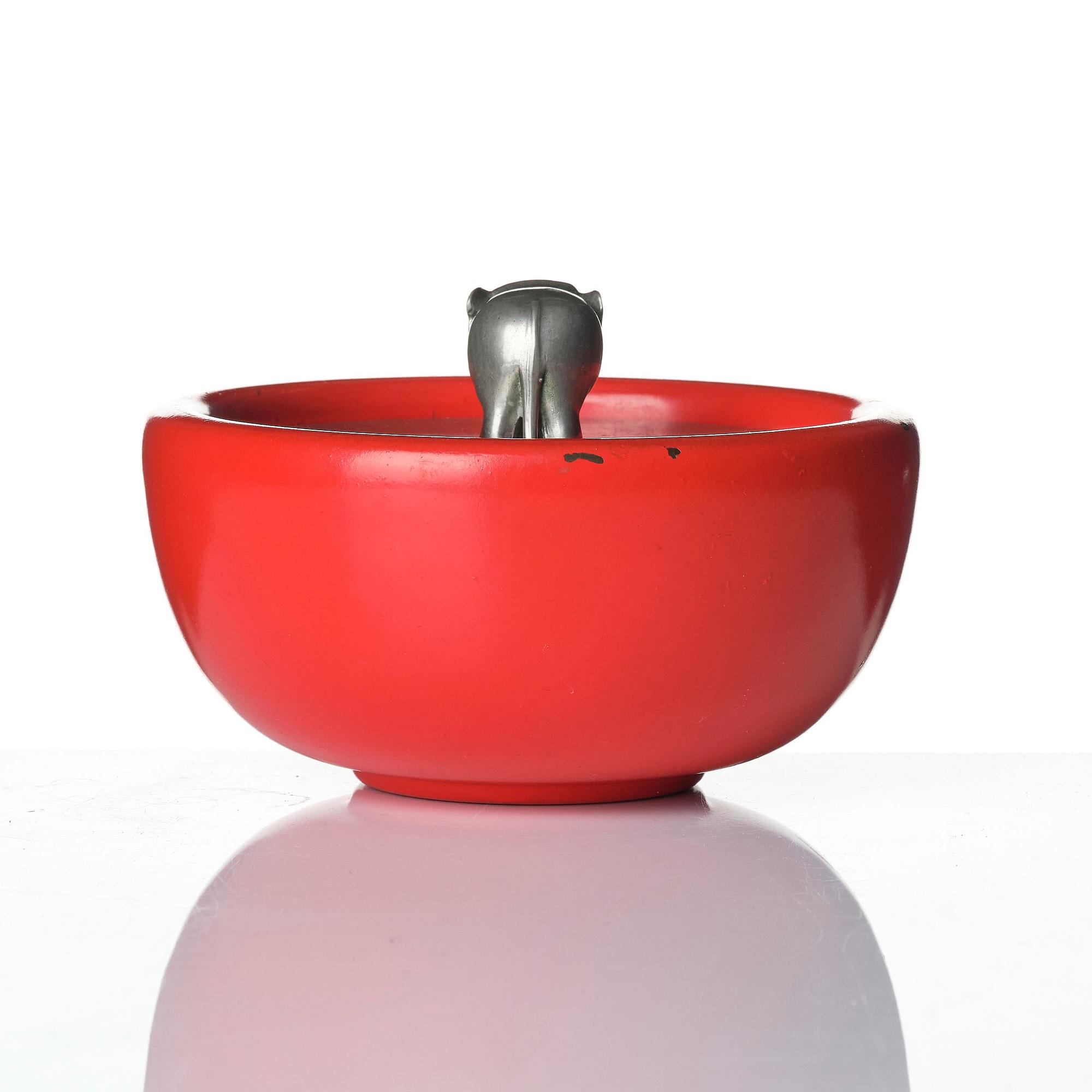 Josef Frank, a red lacquered brass bowl with a pewter cover, Firma Svenskt Tenn, Stockholm, 1949.