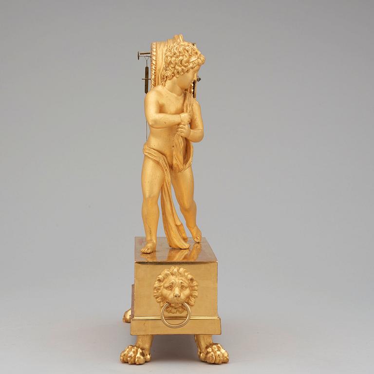 A Swedish Empire early 19th century gilt wood mantel clock by J E Callerström, master 1817.