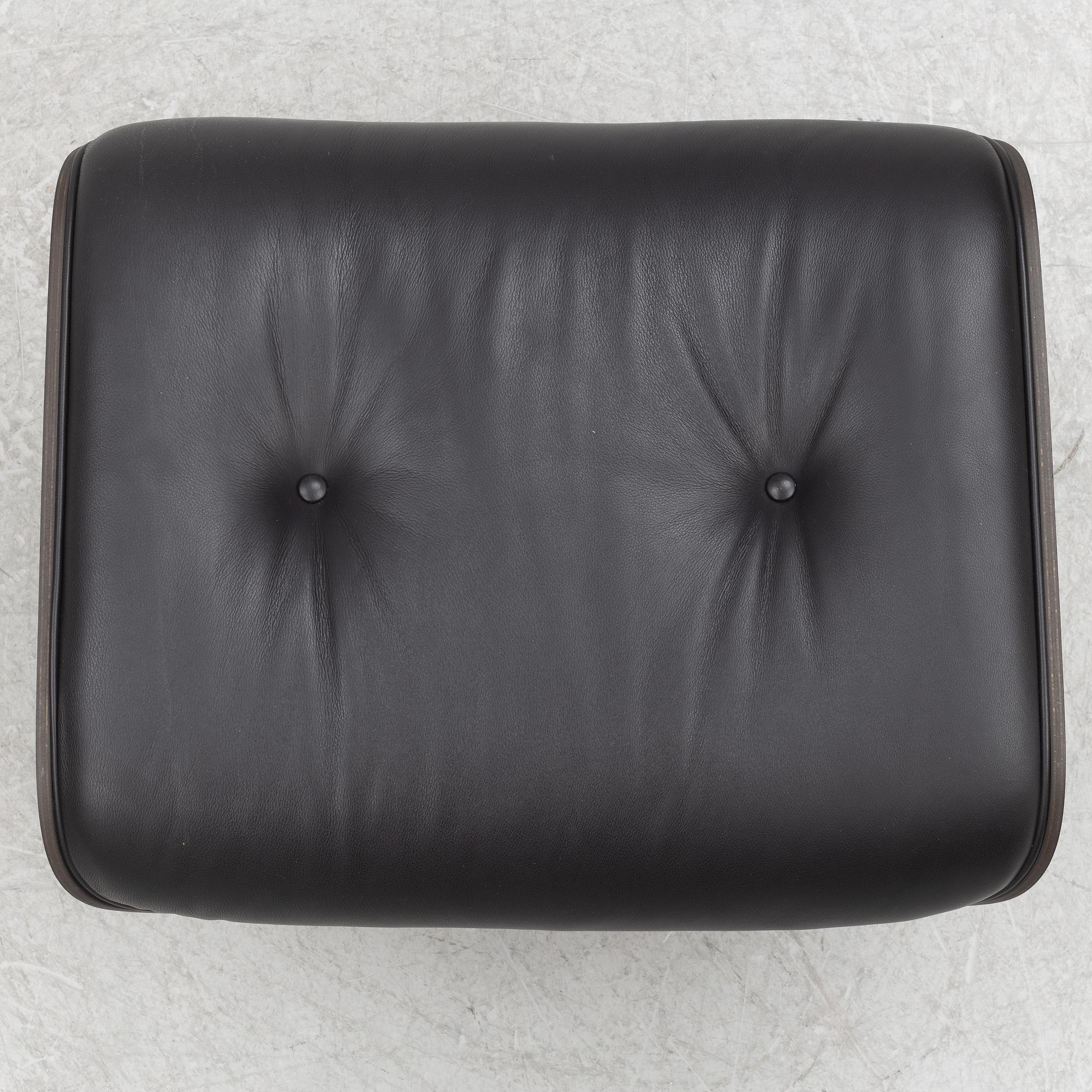 Charles & Ray Eames, an "Eames Lounge Chair" with ottoman, Vitra, 21st century.