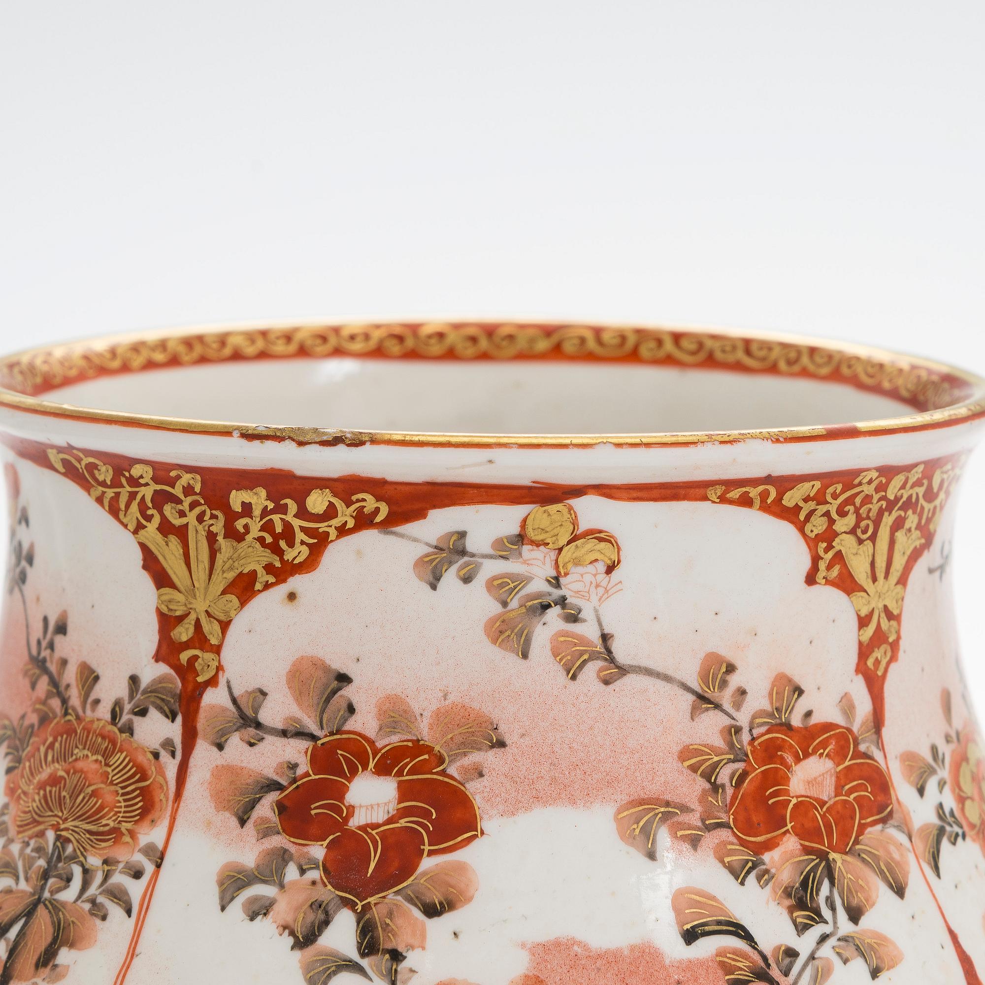 A Japanese porcelain vase from the Meiji period (1868-1912) .