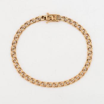 18K gold bracelet.